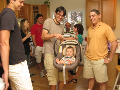 Diogo Andrade shows off baby Tomas at Mauricio's 54th