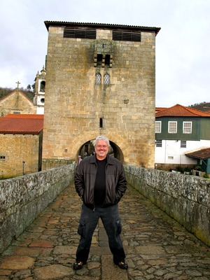 Mauricio at stone bridge in Ucanha, Portugal
