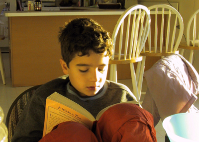 Alec reading Wrinkle in Time