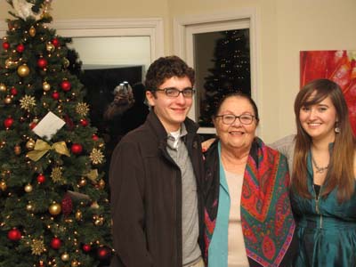 Sasha and Alec with their grandmother Renalva on Christmas eve