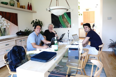 Mauricio working at home with Ricardo Silva and Rodrigo Toso in March